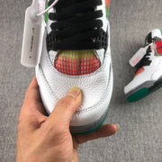 Close-up of the toe area showing black laces, multicolor mesh, white textured upper, and a visible tag marked A09129-100-8.