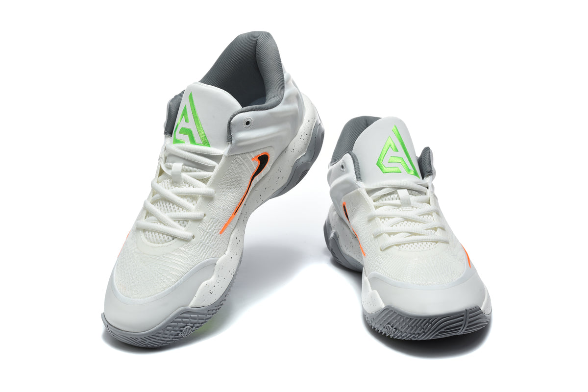 Pair of grey and white Nike basketball shoes shown from the front at an angle