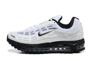 Side view of a white Nike Air Max Plus 3 sneaker with grey accents, black Swoosh and visible Air unit