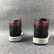Rear view of the pair showing padded burgundy collars, black heel panels, and white midsoles.