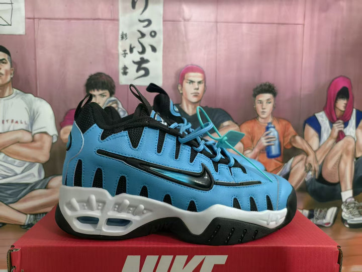 Blue and white Nike sneaker shown from the side on a red Nike shoebox.