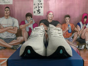 Front view of white Brooks running shoes showing the lace-up uppers and dark outsole accents.