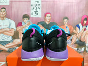 Rear view of black Nike basketball shoes with purple heel sections, blue collar accents, and white outsoles