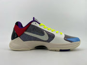 Side profile showing the patterned side panel and blue toe accent