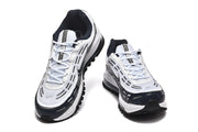 Front view of the Nike Air Max 97 OG sneakers, showing the laces and toe design.