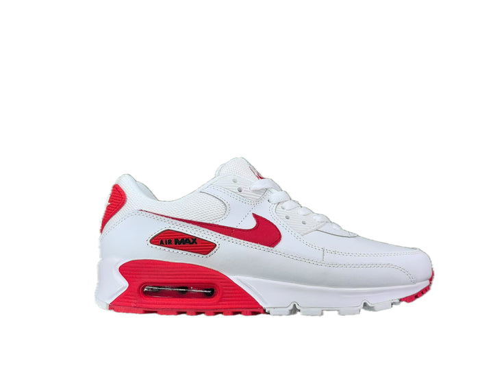 Side view of a white and red Nike Air Max-style low-top sneaker with a lace-up front and heel Air Max window.