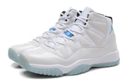 Pair of white high-top Jordan sneakers with light blue details.