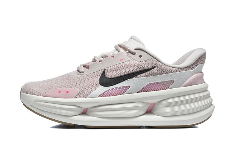 Side view of a pale pink and gray Nike sneaker with a black Swoosh and sculpted white sole