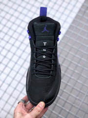 Front view showing the black lace-up upper, padded tongue, and purple Jordan branding.
