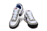 Front view of the white and grey Nike Air Max TW sneakers with black Swoosh logos.