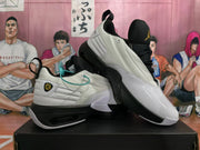 Angled view of the white and black basketball sneakers
