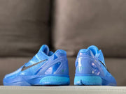 Rear view of the pair showing translucent heel panels and blue heel cushioning areas.