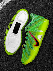 Side view of a neon green Nike sneaker beside its white sole structure.