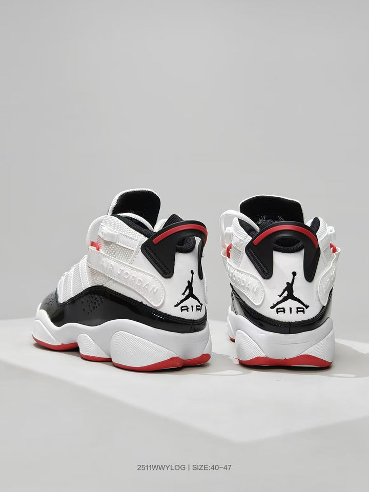 Rear view of white, black, and red high-top sneakers showing Jordan heel branding and padded collars.