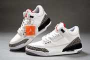 Pair of white and black Air Jordan 3 sneakers shown from the side and three-quarter front angles with elephant-print toe and heel overlays.