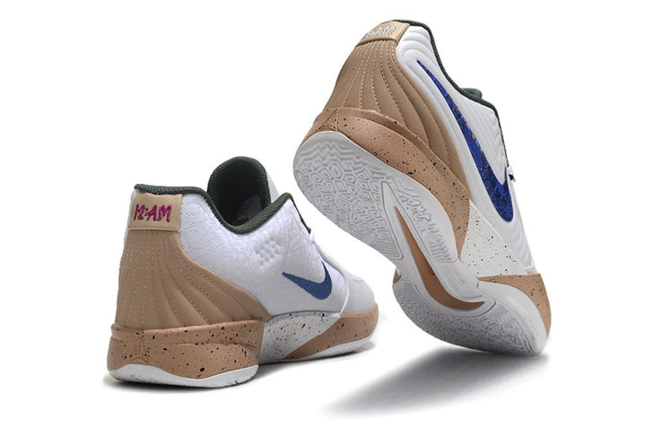 White Nike Ja 2 shoes with blue accents and tan speckled sole, rear and outsole views