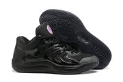 All-black Nike KD 17 basketball shoes with a patterned black outsole.