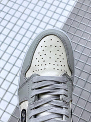 Top view showing the perforated white toe box, gray overlays, and gray laces.