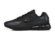 Side profile of a black Nike Air Max sneaker.