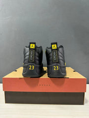 Rear view of the pair showing Jordan heel labels and yellow 23 details.