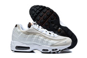Nike Air Max 95 TT sneakers shown from the side with the black outsole visible.