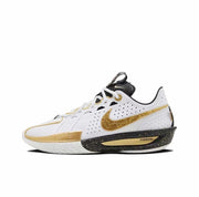 Side view of a white Nike GT Cut 3 sneaker with metallic gold Swoosh details and a black speckled midsole.