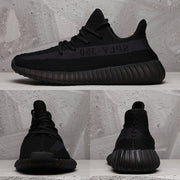 Composite product image showing the black Yeezy 350 V2 from side, front, and rear angles.
