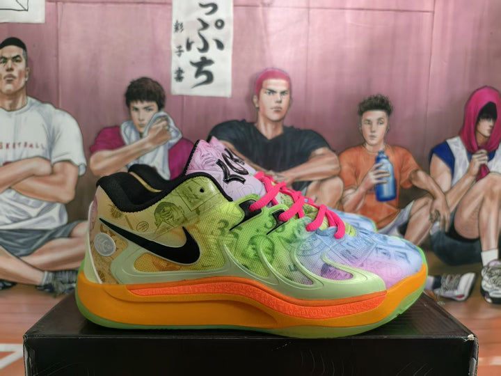 Side view of multicolor Nike KD basketball shoes with pink laces and orange-green soles