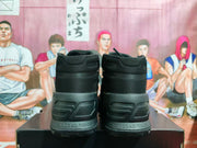 Rear view showing the padded black collars, structured heel sections, and textured outsoles.