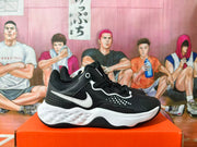 Side view of a black Nike sneaker with a white Swoosh and chunky white midsole