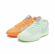Two low-top basketball sneakers in orange and pale mint colorways, shown from an angled front view.