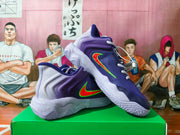 Pair of purple Nike basketball shoes displayed at an angle, showing the Swoosh and outsole.