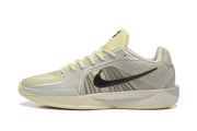 Side profile of a pale yellow and light gray Nike Kobe 5 Protro shoe