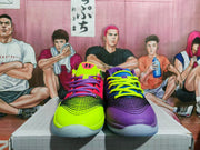 Front view of a mismatched pair of basketball sneakers, with one neon green and pink shoe and one purple and blue shoe.