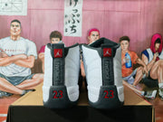 Rear view of the pair showing Jordan branding, padded collars, and red 23 heel details.
