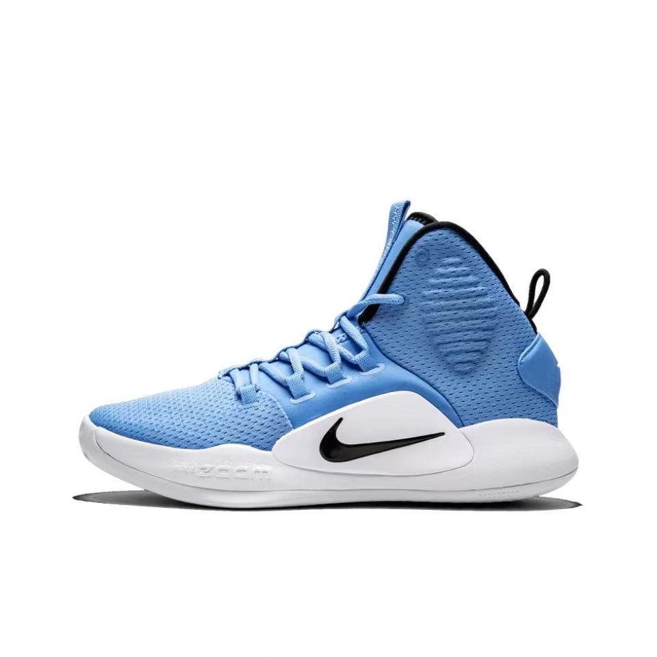 Side view of a Carolina blue high-top Nike basketball shoe with a white sole and black Swoosh.