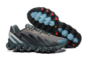 Nike Air Max DN8 sneakers shown from the side and outsole, highlighting the tread and colored sole details.