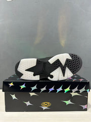 Outsole view showing the black-and-white tread pattern and central Jumpman-shaped design.