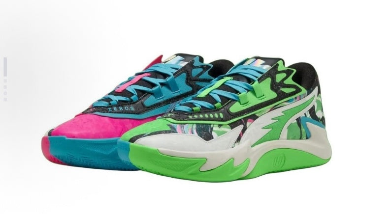 Pair of multicolor low-top sneakers with white, green, blue and pink panels, graphic overlays, contrasting laces, and green-and-white sculpted outsoles.