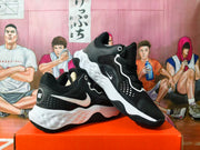 Pair of black Nike sneakers shown from the side and at an angle