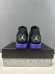 Rear view of a pair of black and purple-blue Jordan Air Jordan 4 sneakers showing the heel logos and colored midsoles.