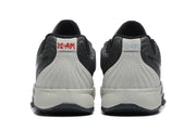 Rear view of the gray Jordan sneakers showing contrasting heel panels and Jordan branding.