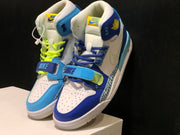 Pair of mismatched blue and white high-top sneakers shown from a front three-quarter angle.
