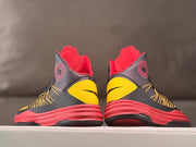 Rear view showing red collars and yellow heel details