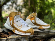 Angled view of the sneakers highlighting the high-top ankle straps