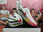 Side view showing the multicolor Nike Swoosh, perforated upper, and Zoom-branded gray midsole.