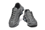 Top and front views of dark grey Nike Shox Ride 2 sneakers