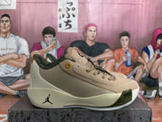 Side profile of a beige and cream basketball sneaker showing the textured side panel, black side logo, sculpted sole, and visible AIR ZOOM marking.