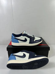 Pair of low-top sneakers showing the white, obsidian, and blue color blocking and textured outsole.