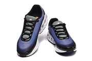 Front view of black and blue Nike sneakers with black laces